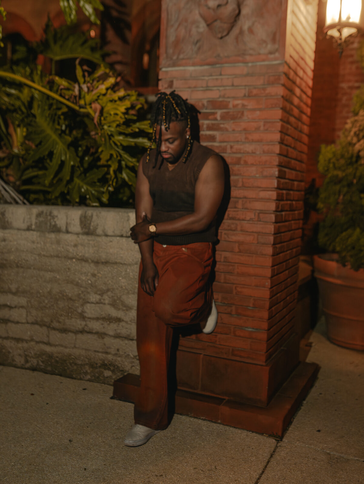 Men's styling, brick column pose